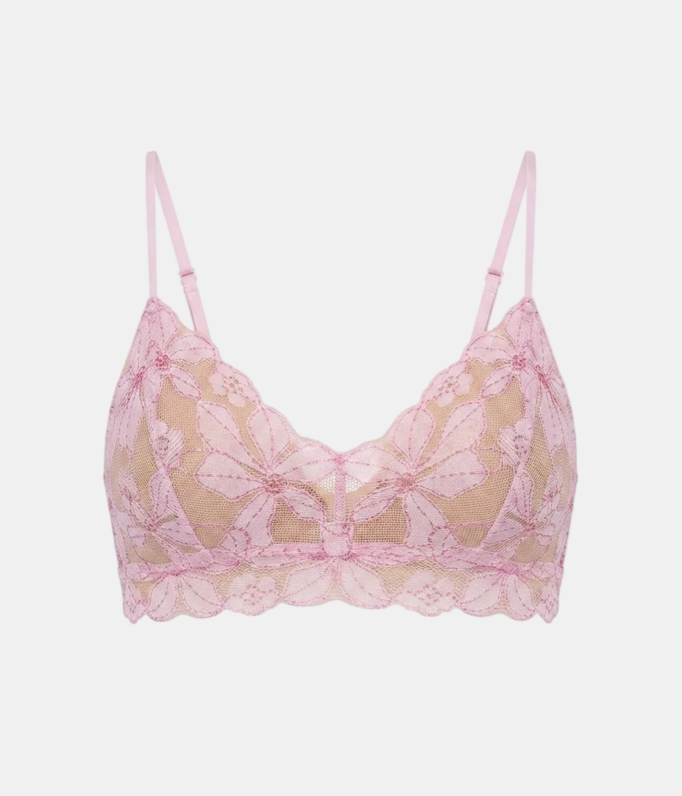 A light pink floral lace underwire bra with thin adjustable shoulder straps and a scalloped lace hem, displayed against a solid white background.