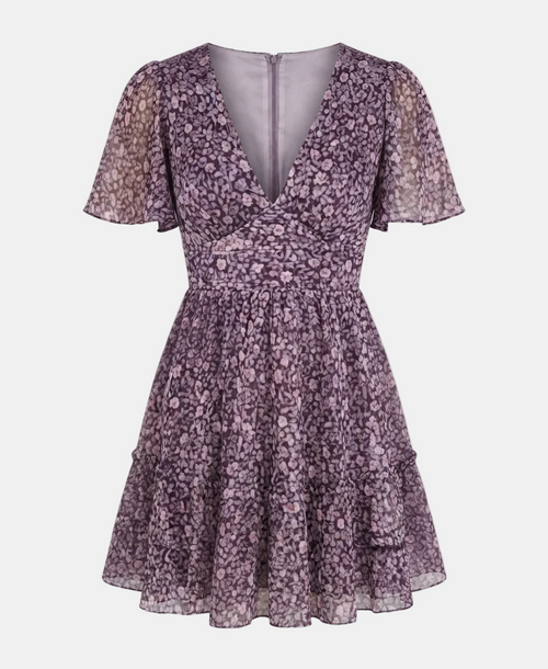 A short-sleeve V-neck dress in a dusty purple and pink floral print, shown against a light gray background.