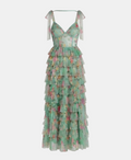 A long tiered tulle dress in mint green with a pink and yellow floral print, featuring thin shoulder straps with bow details, shown against a plain light gray background.