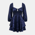 A dark navy blue brocade dress with a square neckline, long puff sleeves, a keyhole cutout at the bust, and a tiered ruffled skirt, shown against a solid gray background.