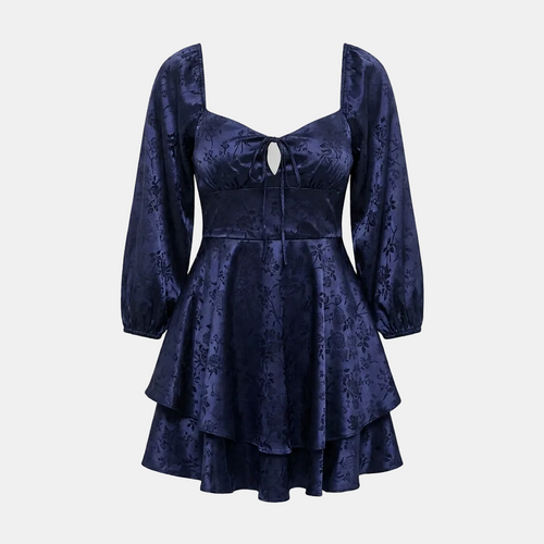 A dark navy blue brocade dress with a square neckline, long puff sleeves, a keyhole cutout at the bust, and a tiered ruffled skirt, shown against a solid gray background.