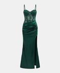 A dark green formal gown with a lace corset bodice, thin spaghetti straps, and a draped satin skirt with a side slit, shown against a light gray background.